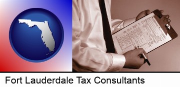 a tax consultant holding an IRS form 1040 in Fort Lauderdale, FL